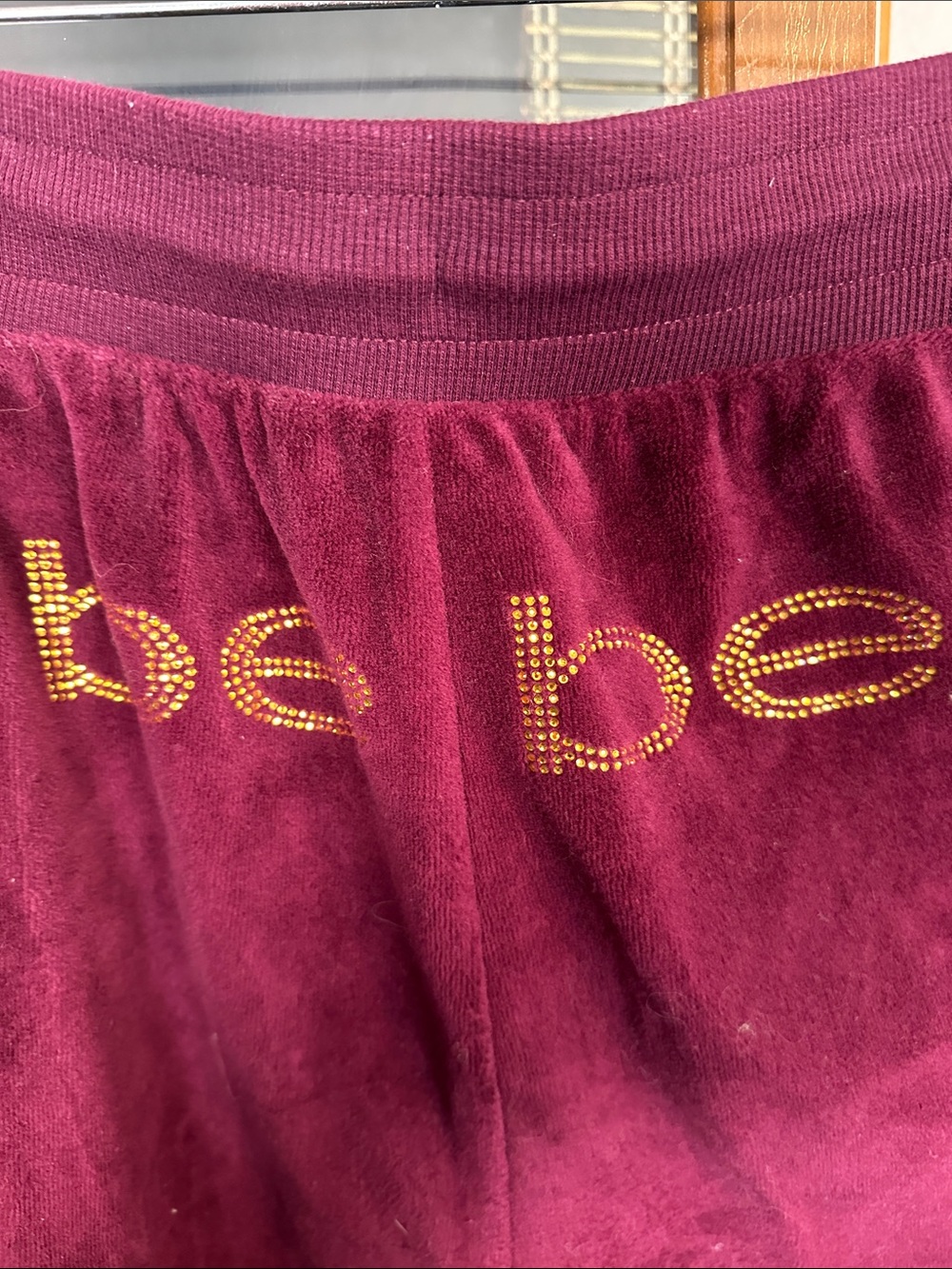 bebe Burgundy Velour Pants with Gold Stud Logo